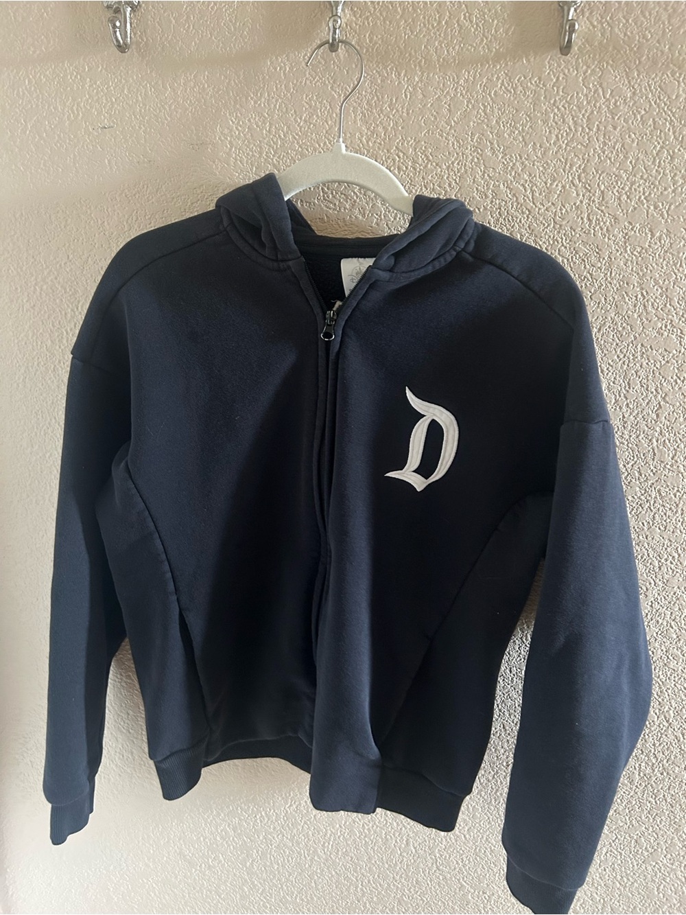 Women’s black Zip-Up Hoodie with White 'D' Accent